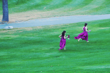 Bridesmaids running at King Valley Golf course. Fall Wedding photography session